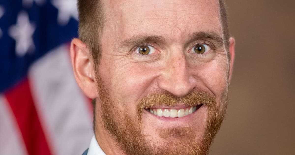 Official portrait of Deputy Assistant Attorney General Jordan Campbell